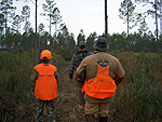Aenea Vignutti and his Dad on their first quail hunt with guide, Matt, in the lead.